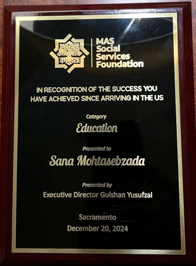 Plaque from MAS Social Services Foundation presented to Sana Mohtasebzada